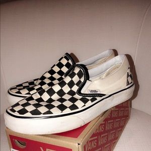 Checkered slip-on vans